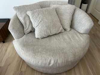 Ashley Oversized Swivel Cuddle Chair – Beige