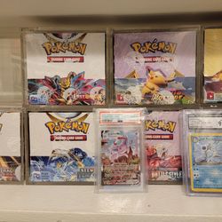 Pokemon booster boxes and psa cgc slabs