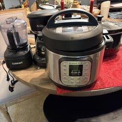 Large Crockpot, Small Grinder, Instant Pot, And Coffee Pot
