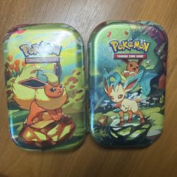 Pokemon prismatic evolutions tins