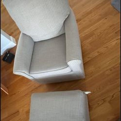Chair with slide ottoman