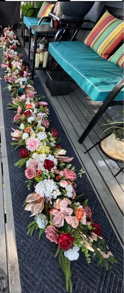 Silk Floral Pieces in pinks mauves and burgandy and white centerpieces