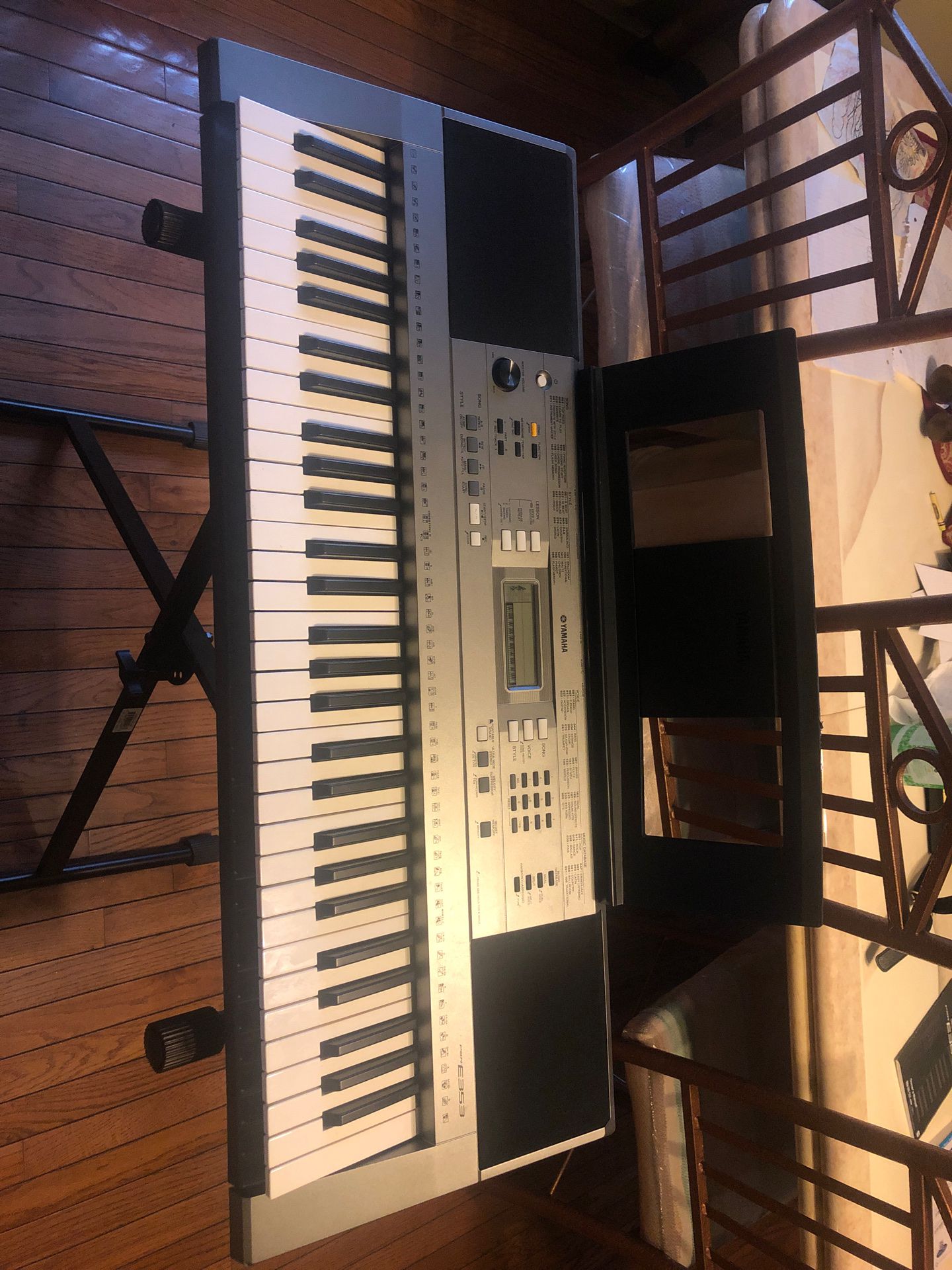 Musical keyboard with stand and learning guides
