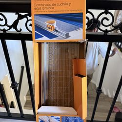 Fiskar rotary cutter and ruler comber