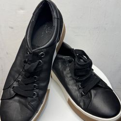 These are black leather Caslon Andes sneakers.