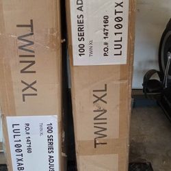 Twin XL ANJUSTABLE BED FRAME $300. Or Best Offer