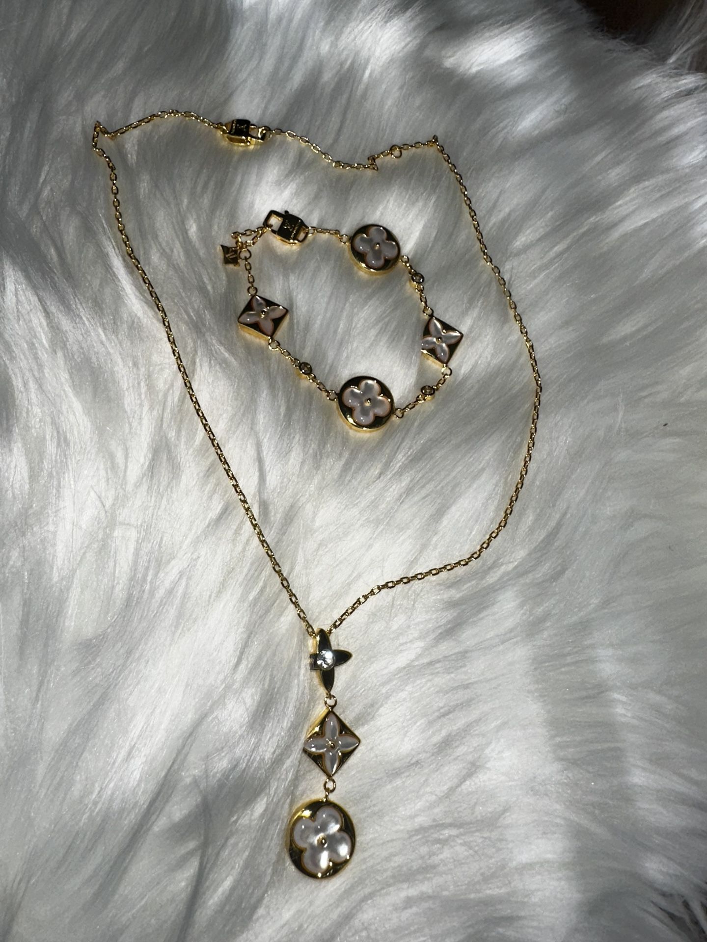 Designer L**V* Gold And White Necklace And Bracelet Set 