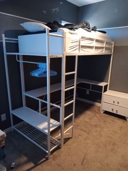 Twin loft bed with L-shaped desk