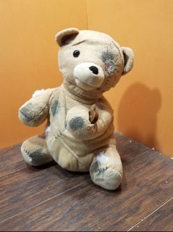 Deady teddy bear stabbing animated Halloween prop