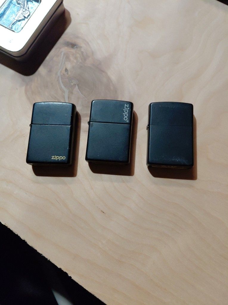 Black Zippos With Brass Bottom
