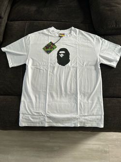 White shirt with small black ape size L