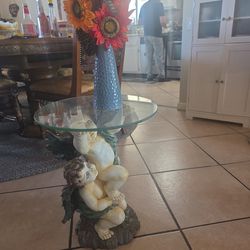 Vintage with  glass table top and case wirh fake flowers