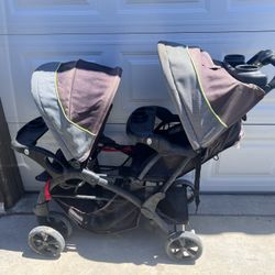 Double Sit In Stand Stroller 