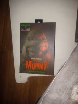 NECA -Teenage Mutant Ninja Turtles 7” Figure Michelangelo as The Mummy Authentic