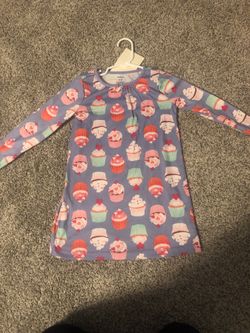 Carters long-sleeved nightgown with cupcakes . Sized 2-3