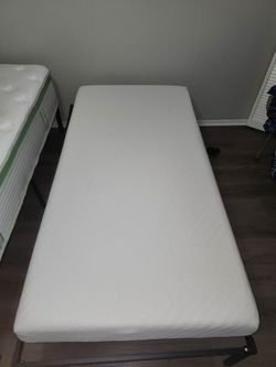 Twin Foam Bed and Full Spring/Foam Bed with Metal Rails