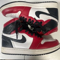 Jordan 1 Retro High Satin Snake in the “Chicago” colorway