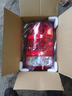 07 to 11 gmc left side tail light new