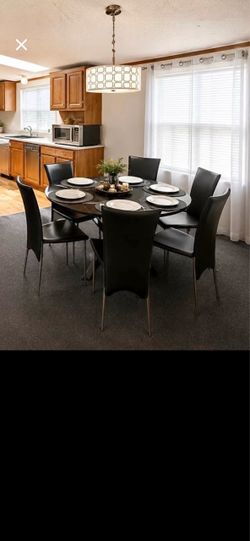 Mesa de vidrio templado con 6 sillas