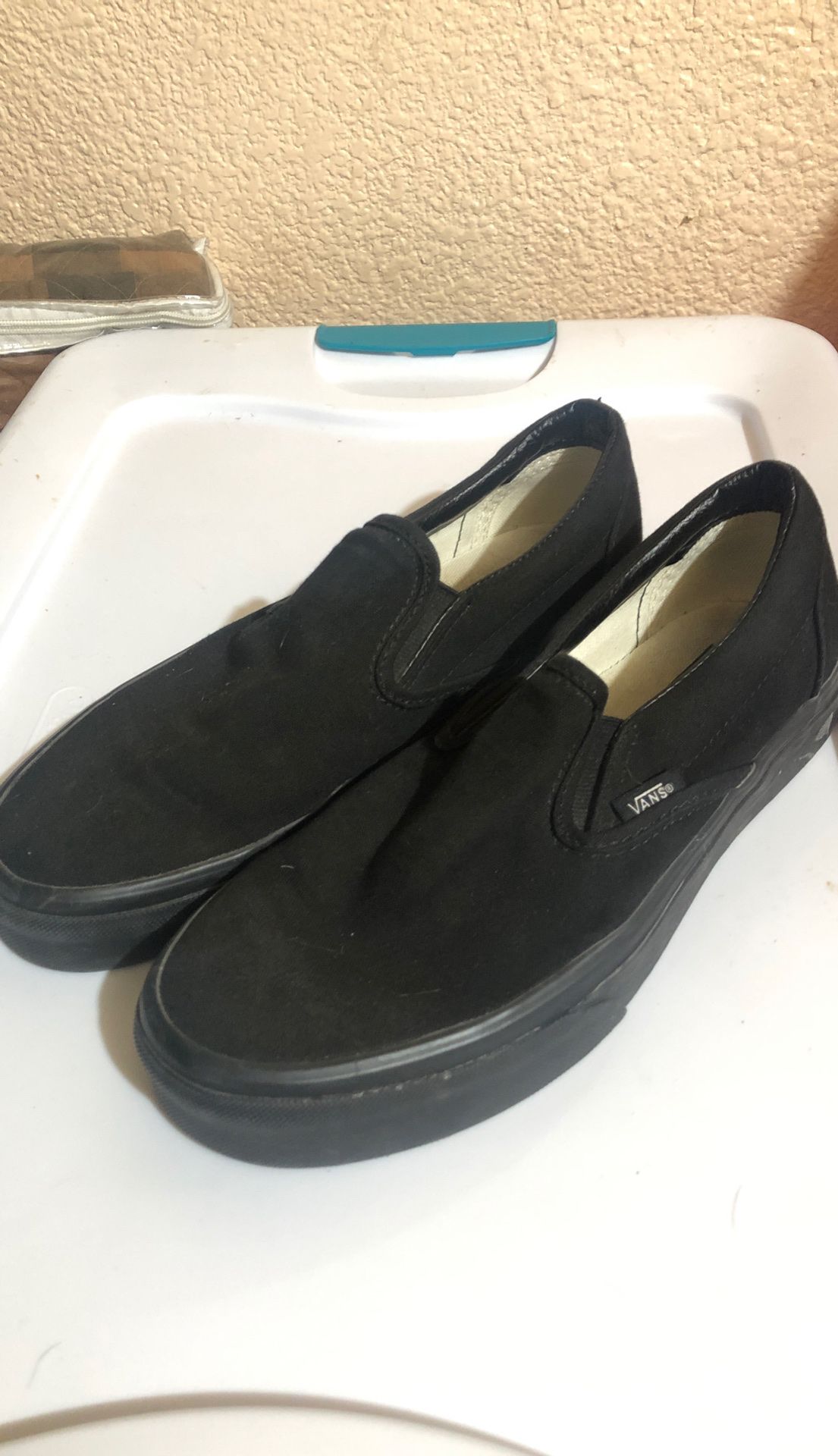 Vans black slip on shoe men’s size 7 woman’s size 8.5