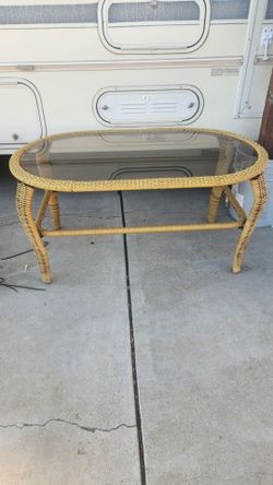 Plastic wicker table