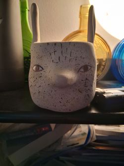 


+1
This is an Anthropologie Bur Ware studio art pottery ceramic fox vase/planter. 