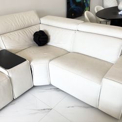 White real leather reclining sectional sofa from City furniture