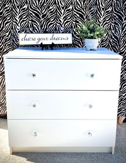 Beautiful refinished three drawer dresser/chest with new Crystal hardware. 32 x 19 x 30 1/2