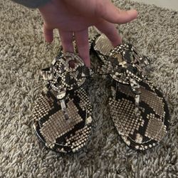 Woman’s snake miller Tory Burch sandals size 8m