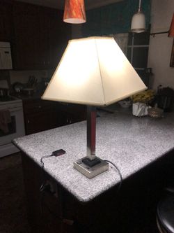 Heavy duty lamp w outlet