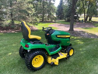 John Deere x540 riding lawnmower with a 54 inch deck and a Liquid cooled Kawasaki Engine