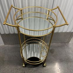 Gold Mirrored serving Bar Cart on wheels.. 21” x 29 “.. $125