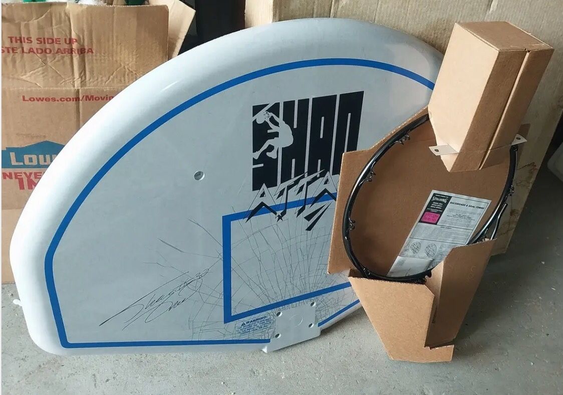 Shaq Basketball Backboard And Hoop. New about 31” high by 44” wide Spaulding