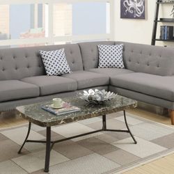 Brand New Grey Sectional Sofa With chaise and accent pillows.