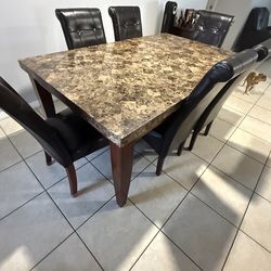 Marble table with 8 chairs