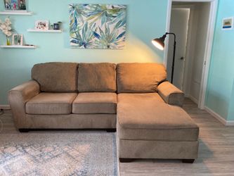 Sofa with attached lounge