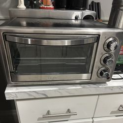 Oster 6-Slice Countertop Toaster Oven Silver (TSSTTVF817) Stainless Steel 1300W