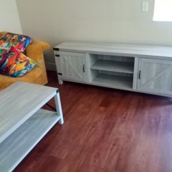 Ashley Furniture Barn Door Console/TV Piece  With Matching Coffee Table 