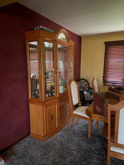 Dining room table with curio cabinet