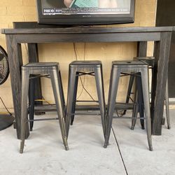 Black Wood Table And 4 Gray Metal Stools 