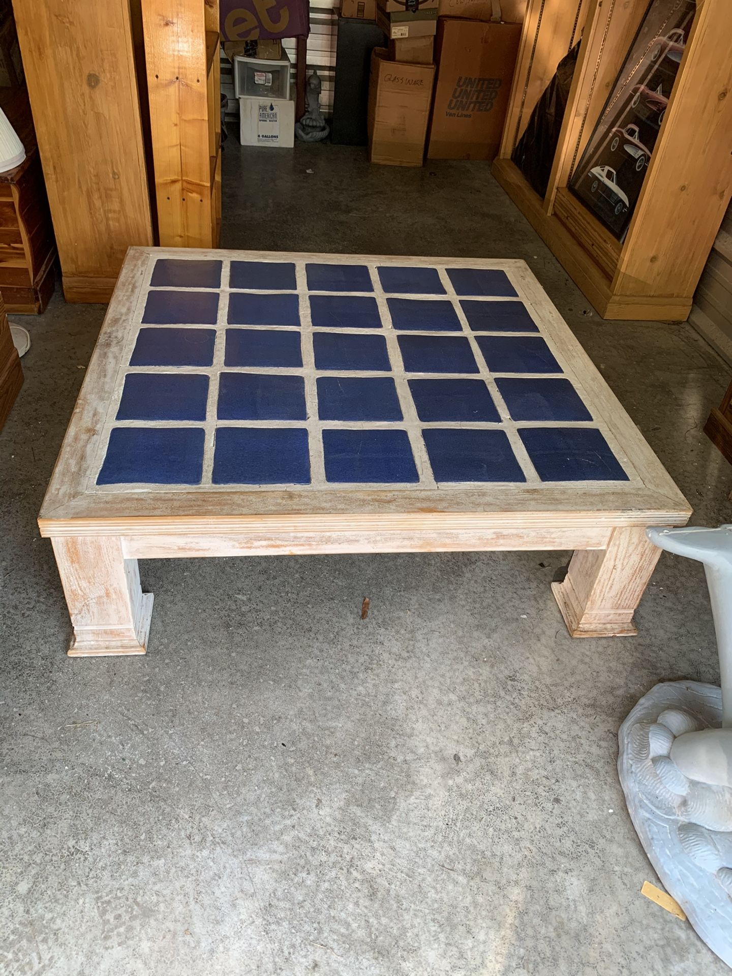 coffee table 48by 48 whitewash with blue tiles