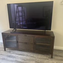 Dark Wood Media TV Stand with glass doors and Slatted Central Drawer