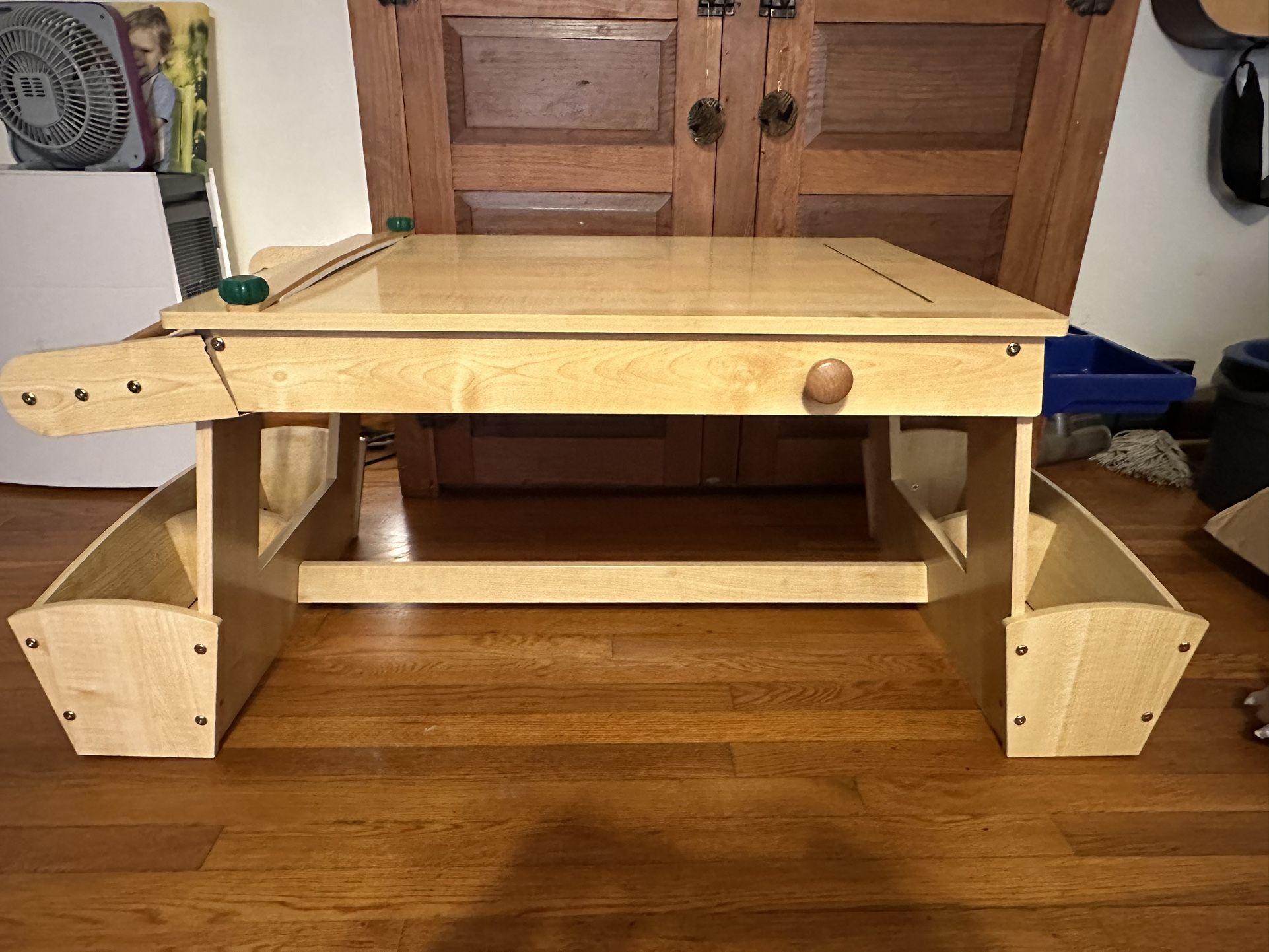 Kids art table. Comes with some roll of paper underneath. Barely used. There is a crack at the end of the table by the drying rack. See pictures.