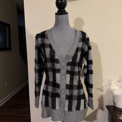 Ladies, cardigan, soft, and warm size medium new with tags