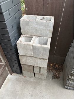 Free: cement cinder blocks, title, and roof shingles