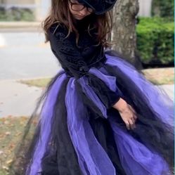 Spirit Halloween NWT Size Kids Medium Purple And Black Witch Costum