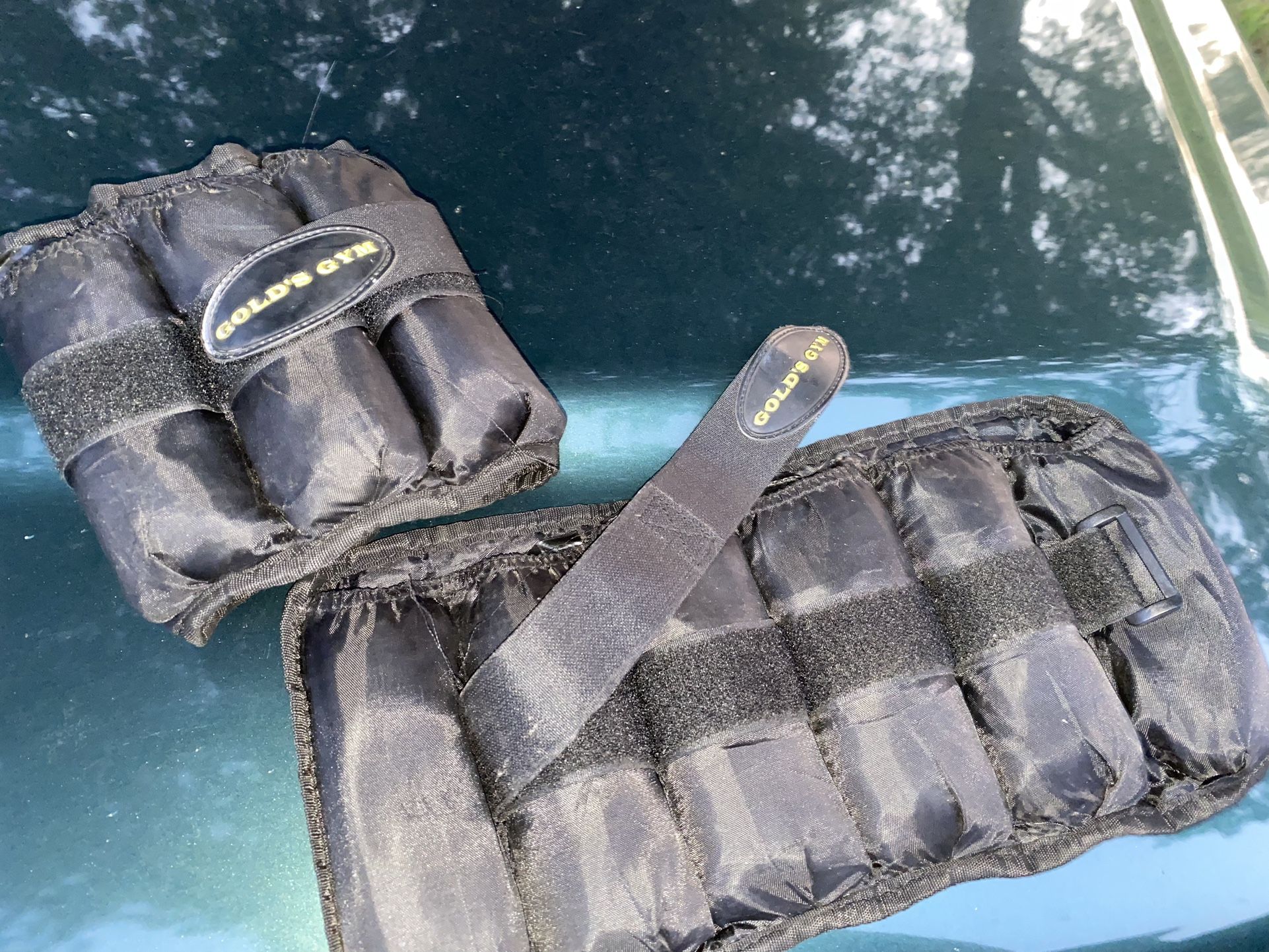 2 sets of ankle weights & a set of wrist/hand weights