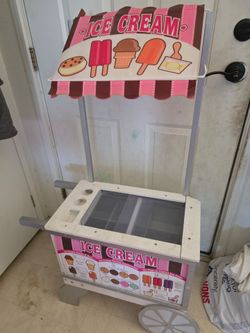 Wooden icecream/ hotdogs cart