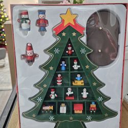 New wooden tree display with little wooden ornaments.
