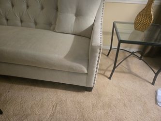 Fabric sofa and chair with nail studs